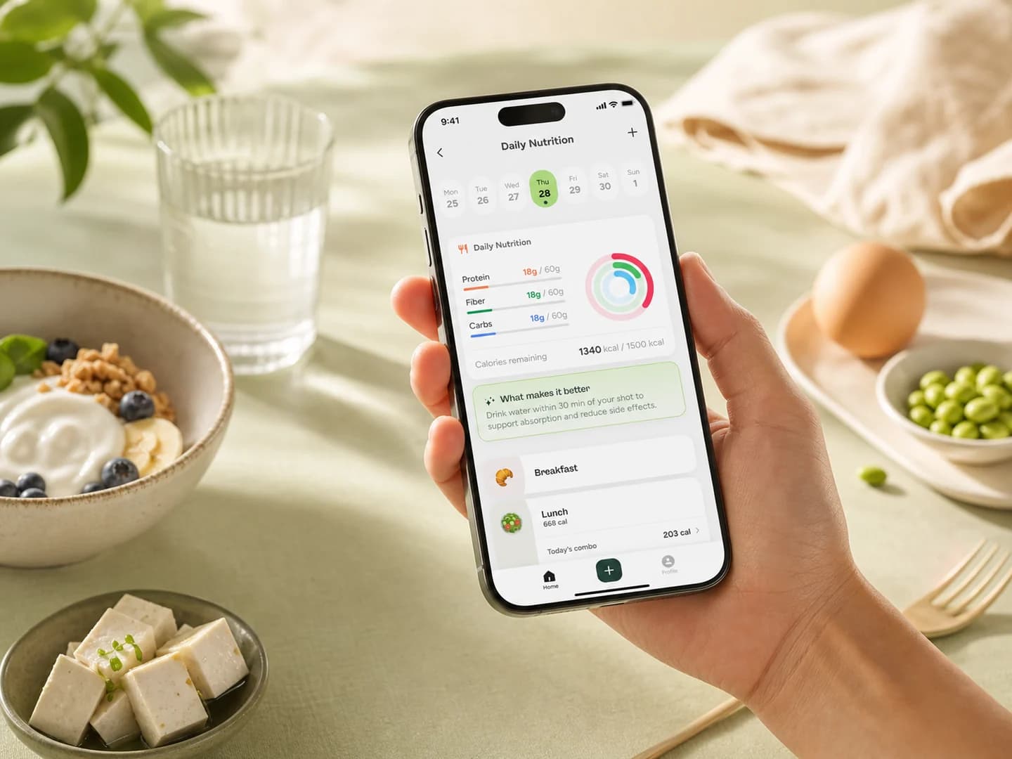 Hand holding a phone with the Glowise Daily Nutrition screen beside simple protein foods and water